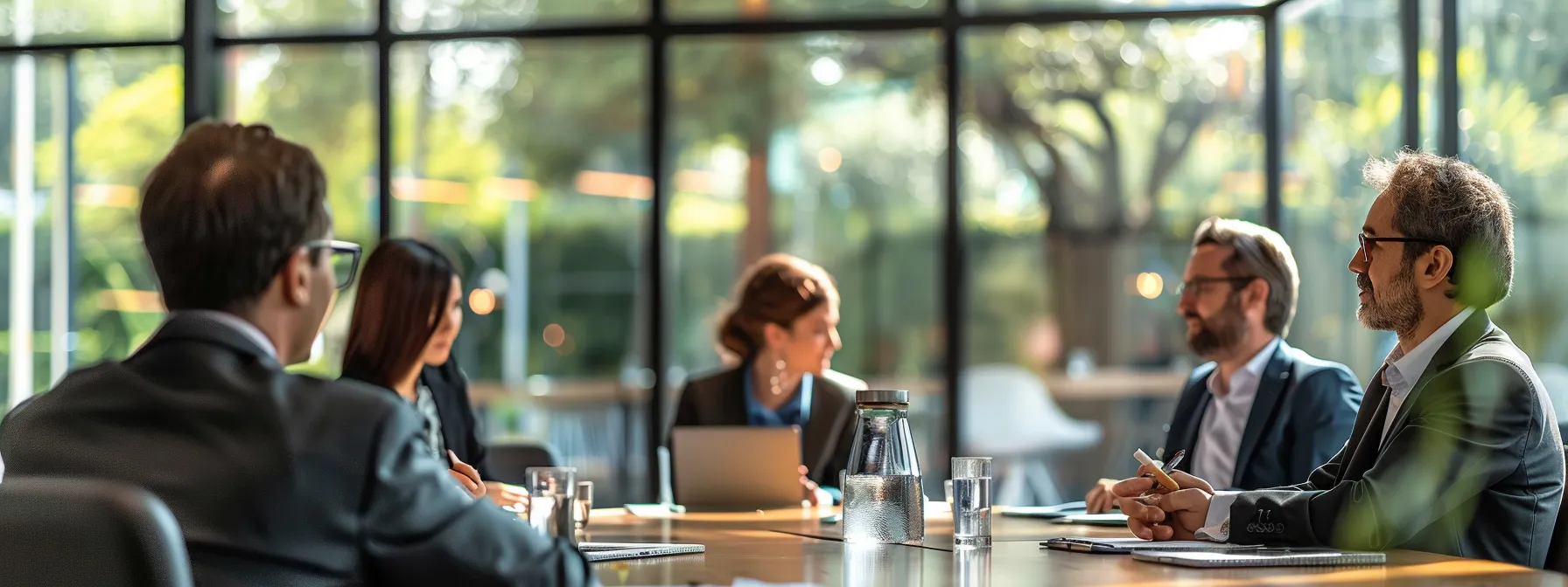 business professionals in a conference room review strategies to enhance local market presence through digital marketing.